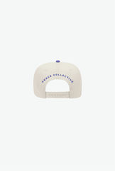 US Soccer | DC Joker A-Frame Cap - Ivory / Purple